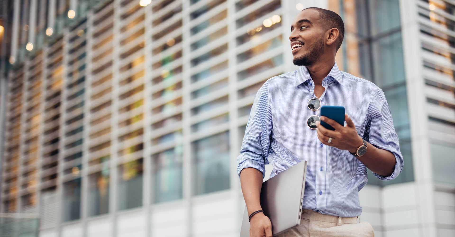 Emerald AC Link App - man using phone geolocation