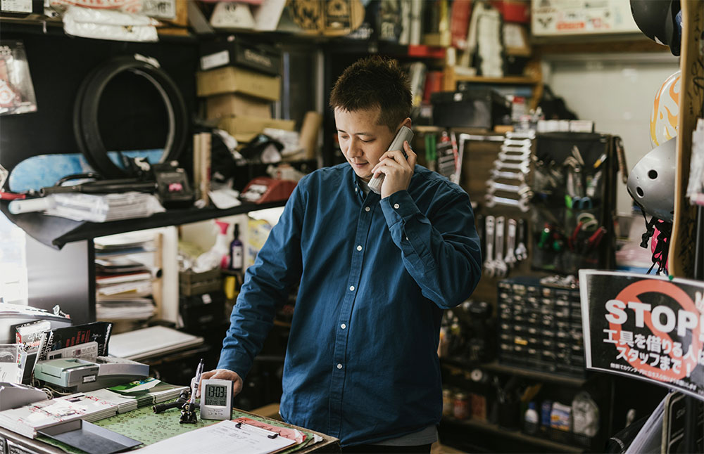 Emerald for business man on phone construction